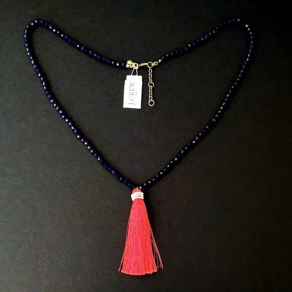 Navy beaded necklace with florescent orange thread tassel - Picture 5 of 12